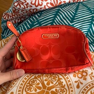 Coach cosmetic bag.